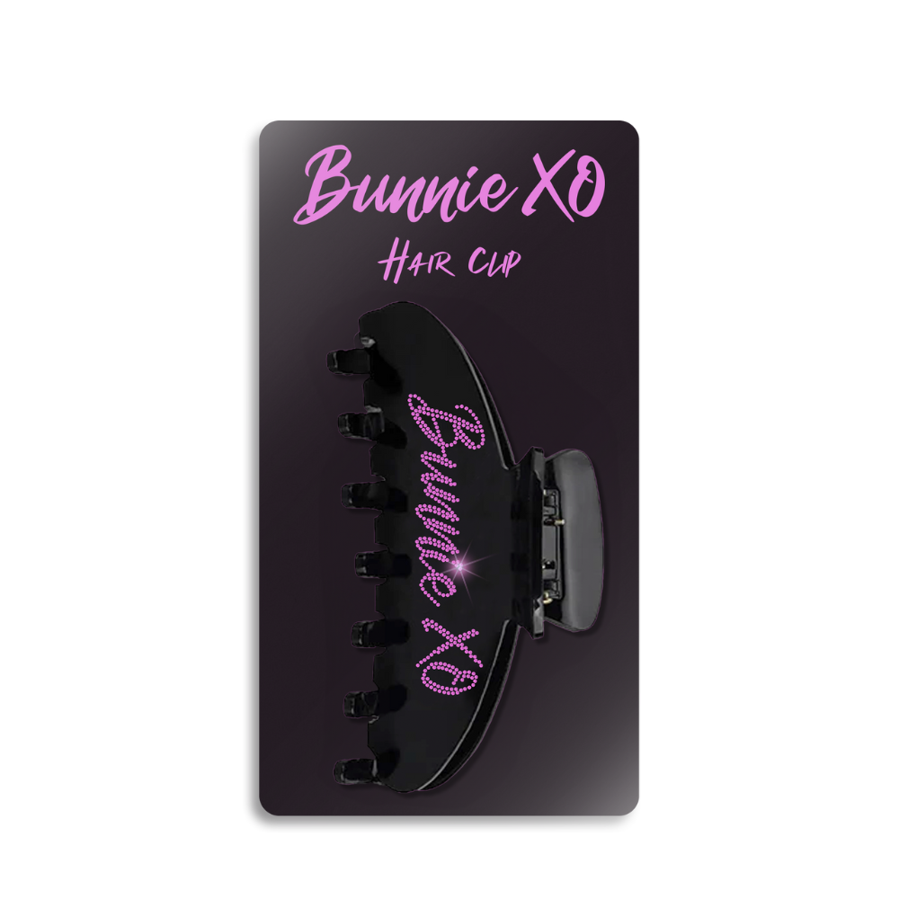 A black claw hair clip with Bunnie XO logo 