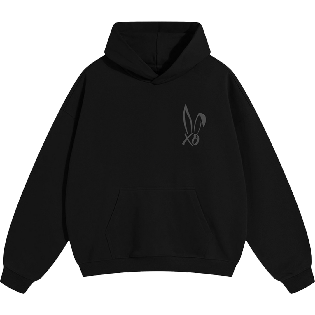 A classic black hoodie with Bunnie Xo logo embroidered in black on the front. 
