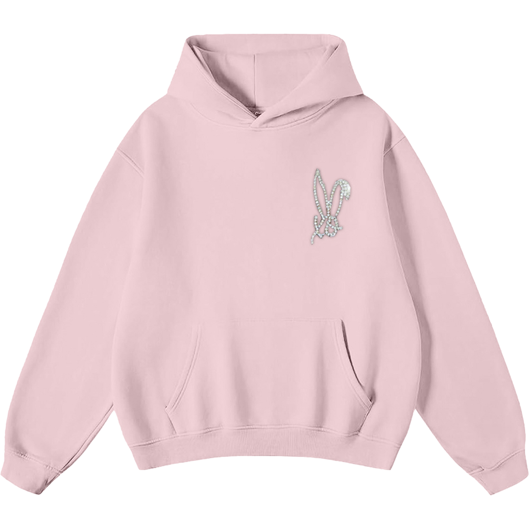 A classic pink pullover hoodie with rhinestone bedazzled Bunnie XO logo on the front.