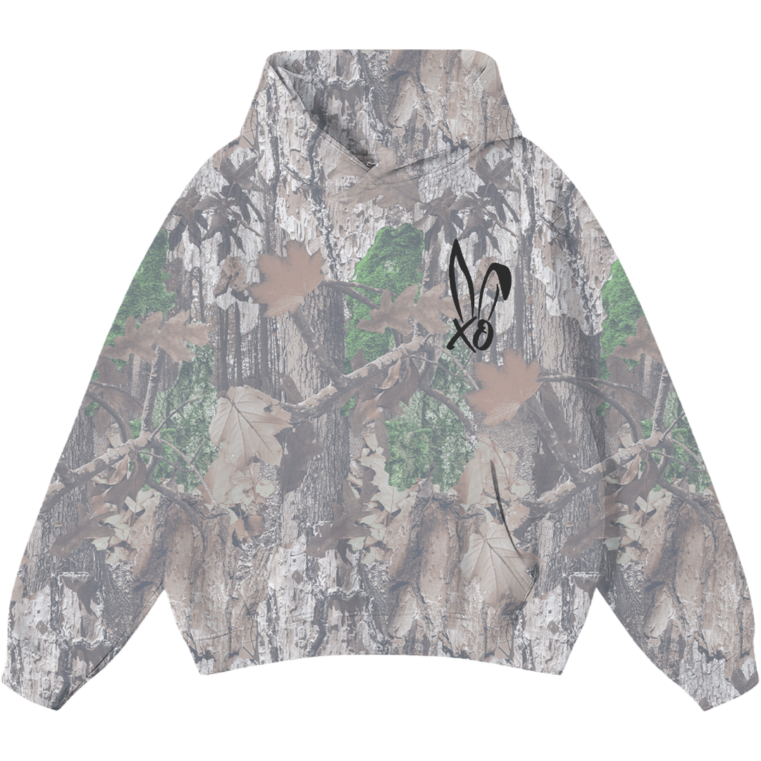 A classic pullover hoodie in a real camo print with Bunnie XO logo embroidered on the front in black. 