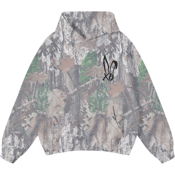 A classic pullover hoodie in a real camo print with Bunnie XO logo embroidered on the front in black. 