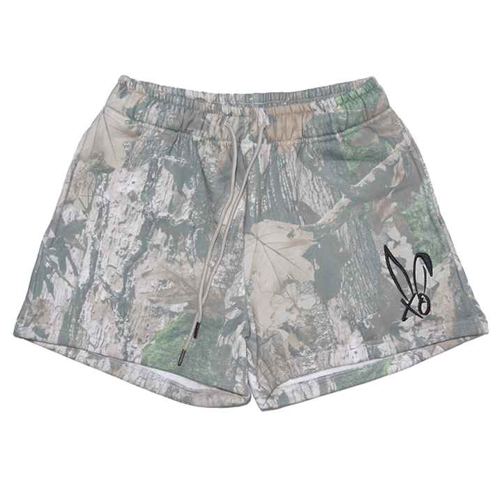 Classic real camo print fleece sweat shorts with the Bunnie Xo logo embroidered in black on the front. 