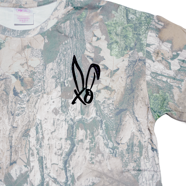 A classic real camo print tee with the Bunnie Xo logo embroidered in black on the front. 